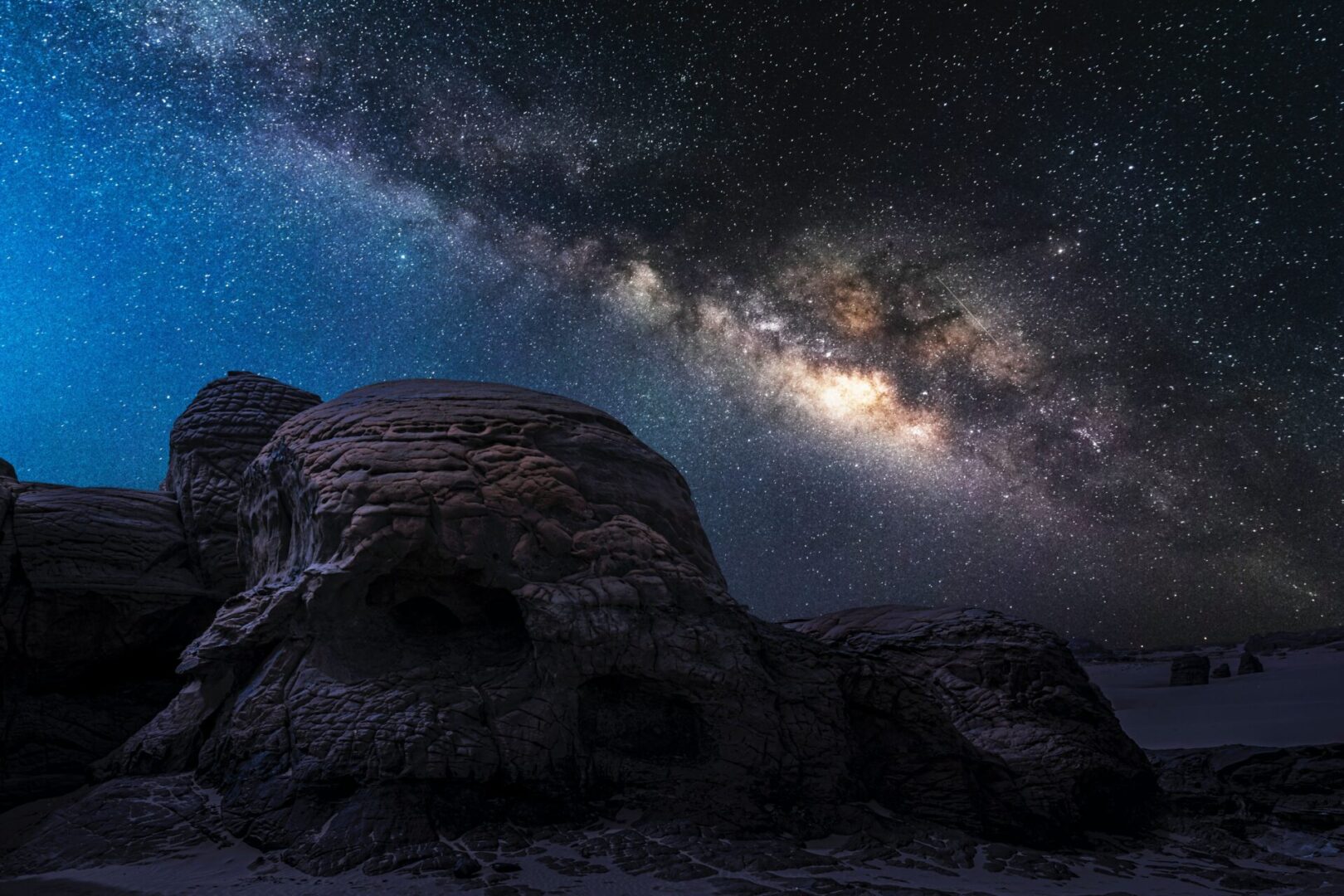 Rocks under the Starry Night Sky